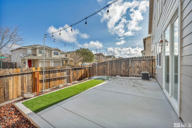 9195 Brown Eagle Ct, Reno, NV 89506 - view of patio featuring cooling unit and a residential view