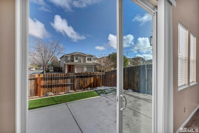 9195 Brown Eagle Ct, Reno, NV 89506 - entryway featuring baseboards, a residential view, and plenty of natural light