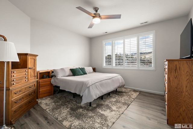 5895 Tappan Dr, Reno, NV 89523 - bedroom featuring wood finished floors, baseboards, and a ceiling fan