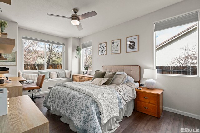 5895 Tappan Dr, Reno, NV 89523 - bedroom with baseboards, dark wood-type flooring, and a ceiling fan