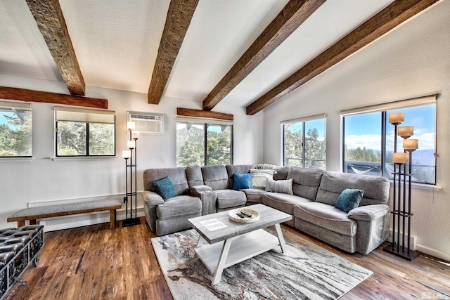 243 Tramway Dr, Stateline, NV 89449 - living area with a wall unit AC, wood finished floors, baseboards, and beam ceiling