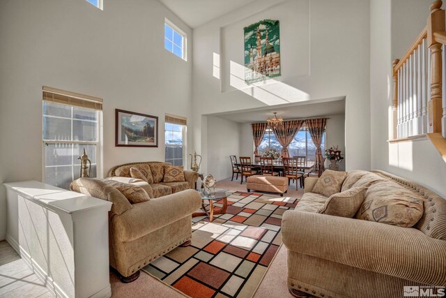 2861 Sunline Dr, Reno, NV 89523 - living area with a high ceiling and light colored carpet