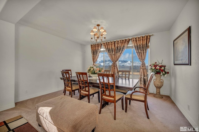 2861 Sunline Dr, Reno, NV 89523 - dining room with light colored carpet, a chandelier, and baseboards