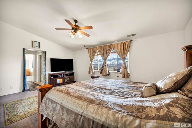 2861 Sunline Dr, Reno, NV 89523 - bedroom with vaulted ceiling, carpet floors, and a ceiling fan