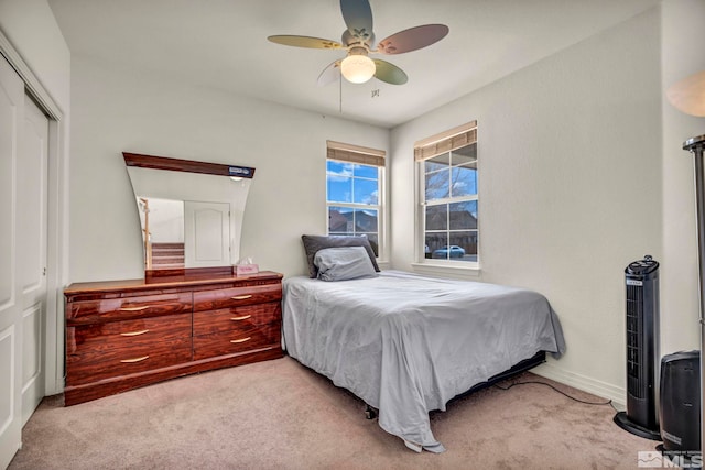 2861 Sunline Dr, Reno, NV 89523 - bedroom featuring carpet, a closet, a ceiling fan, and baseboards