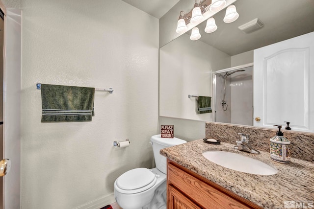 2861 Sunline Dr, Reno, NV 89523 - bathroom with a stall shower, toilet, and vanity
