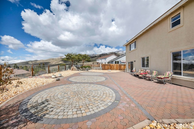 2861 Sunline Dr, Reno, NV 89523 - view of patio / terrace with a fenced backyard and a mountain view