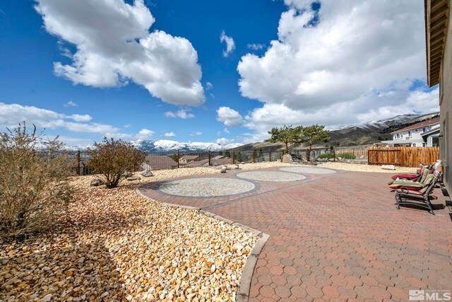 2861 Sunline Dr, Reno, NV 89523 - fenced backyard featuring a patio area and a mountain view