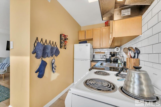 280 Island Ave Unit 607, Reno, NV 89501 - kitchen with white appliances, a sink, wall chimney exhaust hood, light brown cabinets, and backsplash