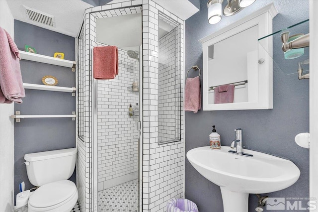 280 Island Ave Unit 607, Reno, NV 89501 - bathroom with a shower stall, toilet, and a sink