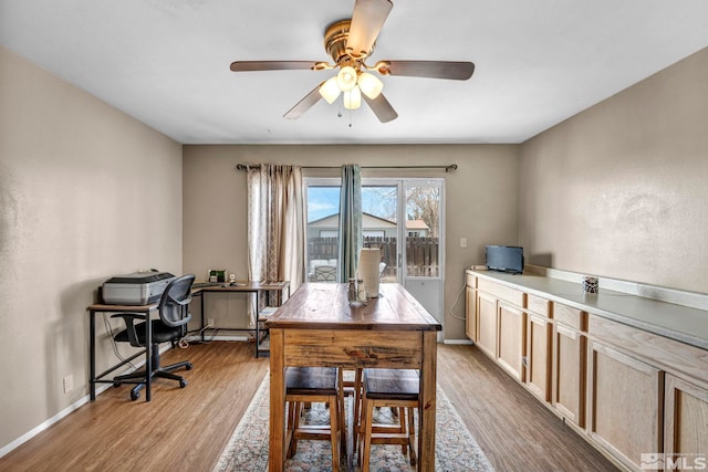 435 Cindy, Fallon, NV 89406 - dining room with a desk, wood finished floors, ceiling fan, and baseboards