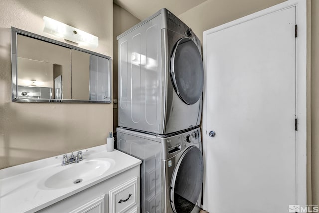 435 Cindy, Fallon, NV 89406 - clothes washing area featuring stacked washing machine and dryer
