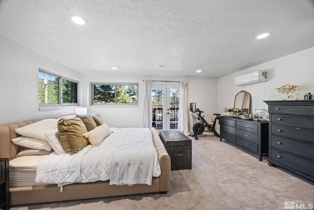 3055 US Highway 395, Washoe Valley, NV 89704 - bedroom with a wall unit AC, access to outside, french doors, multiple windows, and recessed lighting