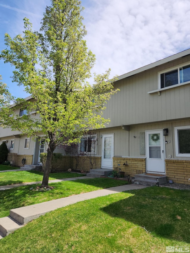 1363 Waterloo Ln, Gardnerville, NV 89410 - view of property with brick siding, a front lawn, and entry steps