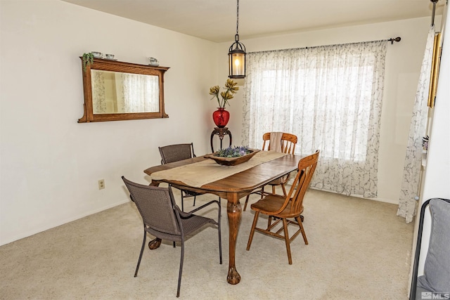 4635 Country River Dr, Fallon, NV 89406 - dining room featuring light carpet and baseboards