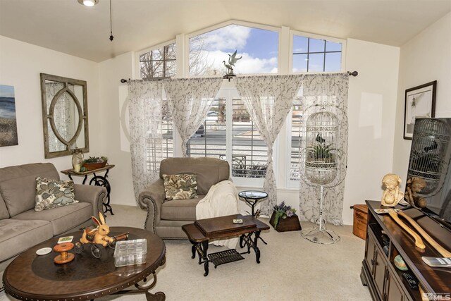 4635 Country River Dr, Fallon, NV 89406 - living room with light carpet, vaulted ceiling, and healthy amount of natural light