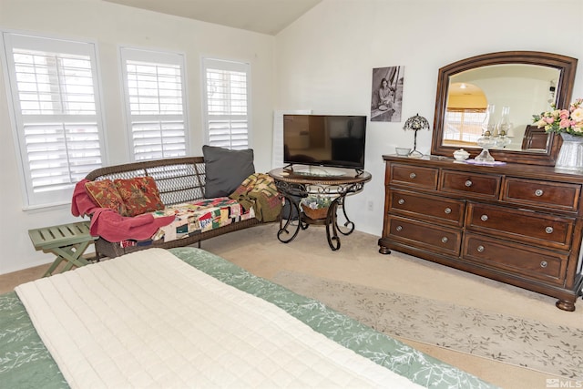 4635 Country River Dr, Fallon, NV 89406 - bedroom featuring multiple windows, lofted ceiling, and light carpet