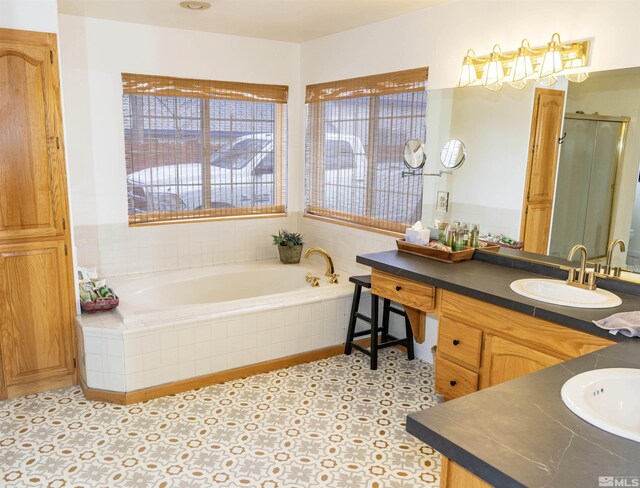 4635 Country River Dr, Fallon, NV 89406 - full bath with a bath, vanity, and a stall shower