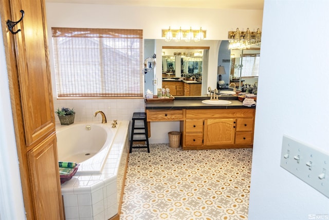 4635 Country River Dr, Fallon, NV 89406 - full bathroom featuring a garden tub and vanity