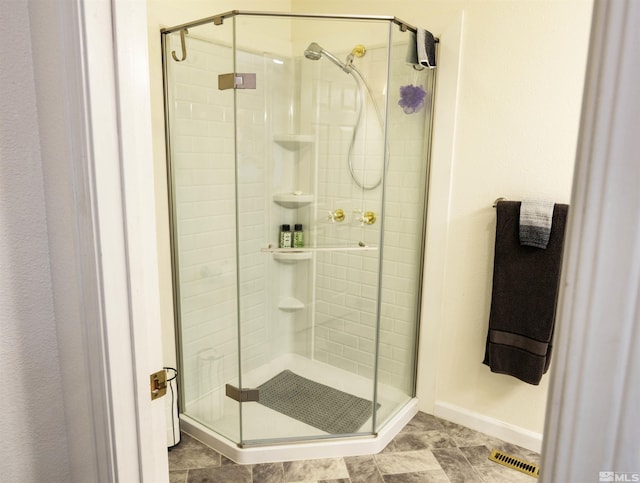 4635 Country River Dr, Fallon, NV 89406 - bathroom featuring a shower stall and baseboards
