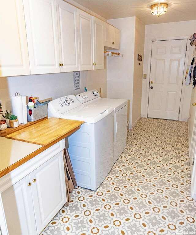 4635 Country River Dr, Fallon, NV 89406 - laundry room with cabinet space, separate washer and dryer, light floors, and baseboards