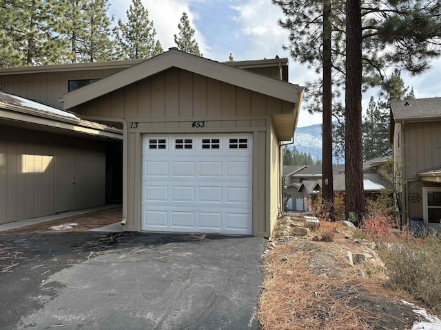 453 Mcfaul Unit 13, Zephyr Cove, NV 89448 - garage with driveway and a mountain view