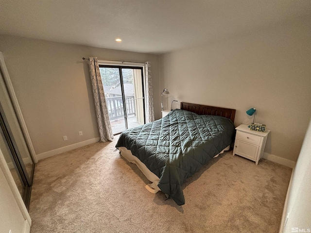453 Mcfaul Unit 13, Zephyr Cove, NV 89448 - bedroom featuring access to outside, light carpet, recessed lighting, and baseboards