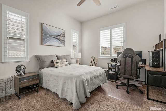 1046 Savona Ct, Dayton, NV 89403 - bedroom with carpet flooring, an office area, and a ceiling fan