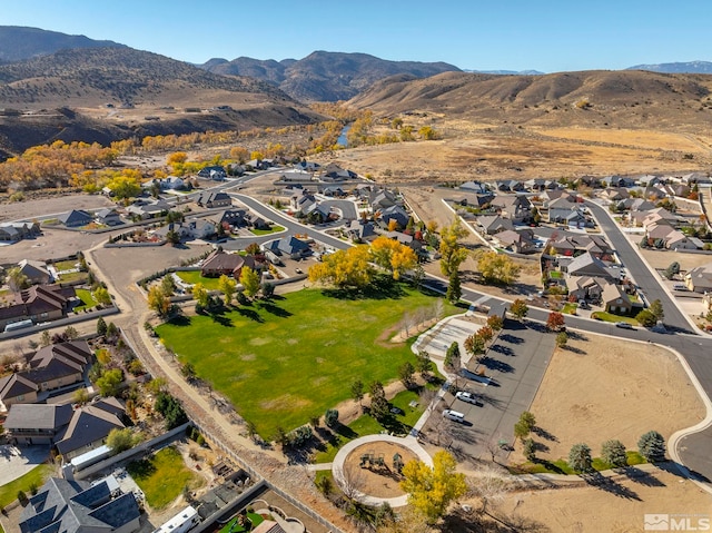 1046 Savona Ct, Dayton, NV 89403 - aerial overview of property's location with nearby suburban area and a mountain backdrop