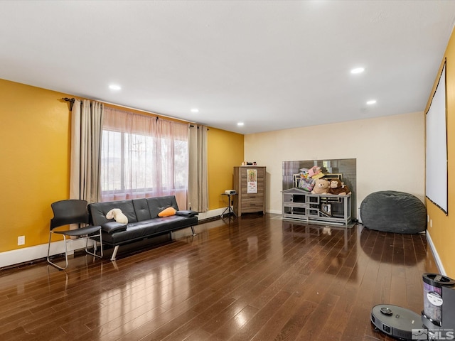 1879 Kings Canyon Rd, Carson City, NV 89703 - living area with wood finished floors, baseboards, and recessed lighting