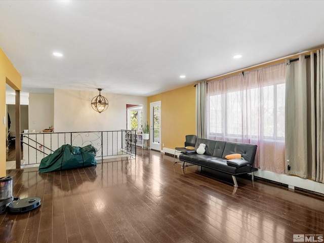 1879 Kings Canyon Rd, Carson City, NV 89703 - living area featuring an upstairs landing, hardwood / wood-style flooring, a chandelier, baseboards, and recessed lighting