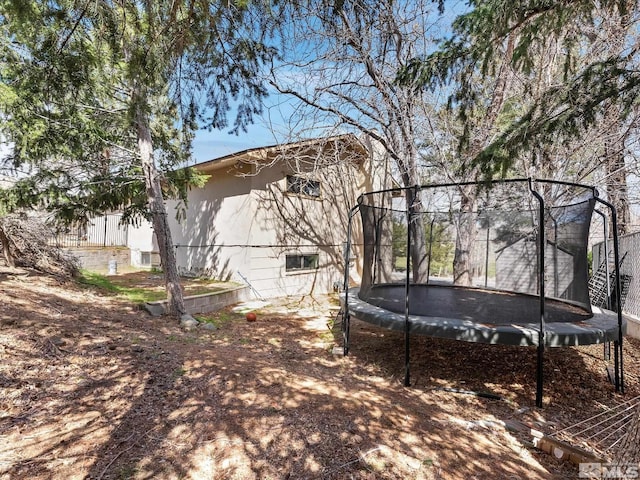 1879 Kings Canyon Rd, Carson City, NV 89703 - view of yard with a trampoline