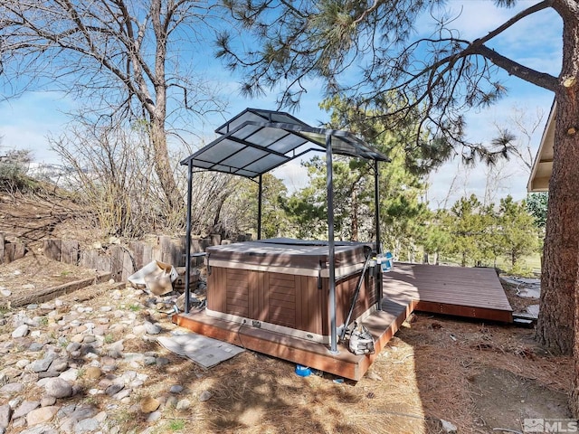 1879 Kings Canyon Rd, Carson City, NV 89703 - wooden terrace featuring a hot tub