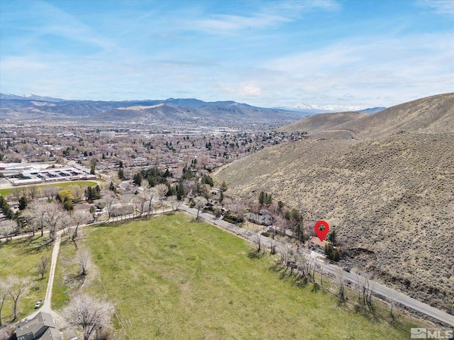 1879 Kings Canyon Rd, Carson City, NV 89703 - aerial overview of property's location with a mountainous background