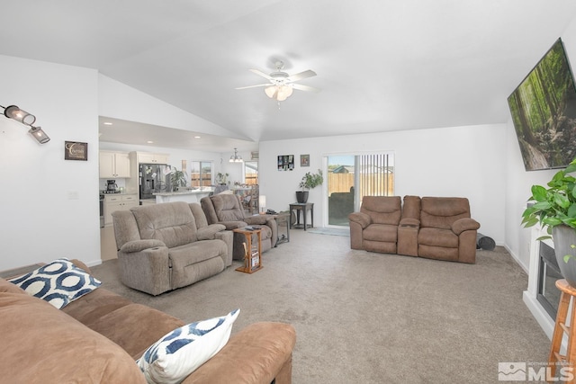 756 Megan Way, Fallon, NV 89406 - living area with a ceiling fan, lofted ceiling, plenty of natural light, and light carpet