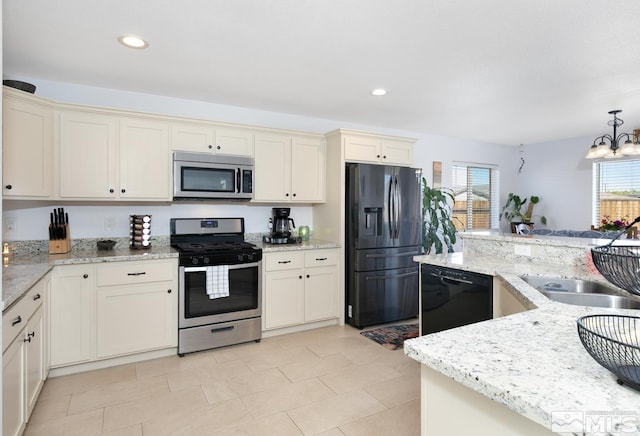 756 Megan Way, Fallon, NV 89406 - kitchen with appliances with stainless steel finishes, plenty of natural light, a chandelier, decorative light fixtures, and recessed lighting