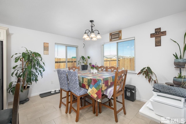 756 Megan Way, Fallon, NV 89406 - dining room featuring a chandelier and baseboards