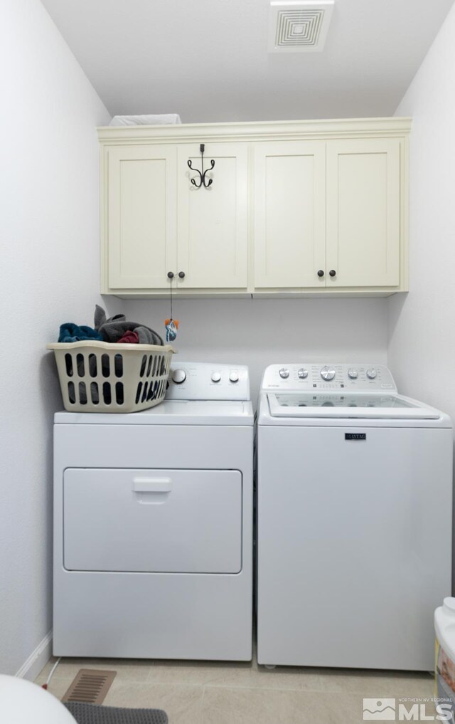 756 Megan Way, Fallon, NV 89406 - washroom with cabinet space, separate washer and dryer, baseboards, and light tile patterned floors