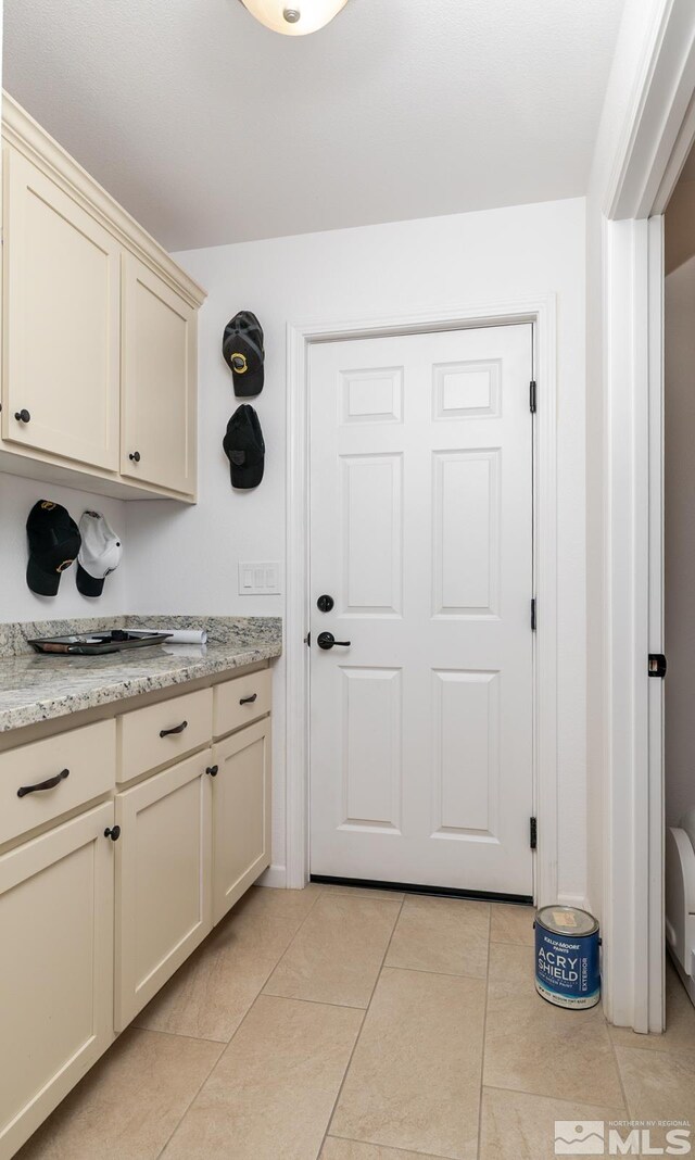 756 Megan Way, Fallon, NV 89406 - laundry room featuring light tile patterned flooring