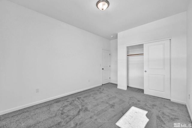 6772 Shell Ct Lot 49, Fernley, NV 89408 - unfurnished bedroom with carpet floors, baseboards, and a closet