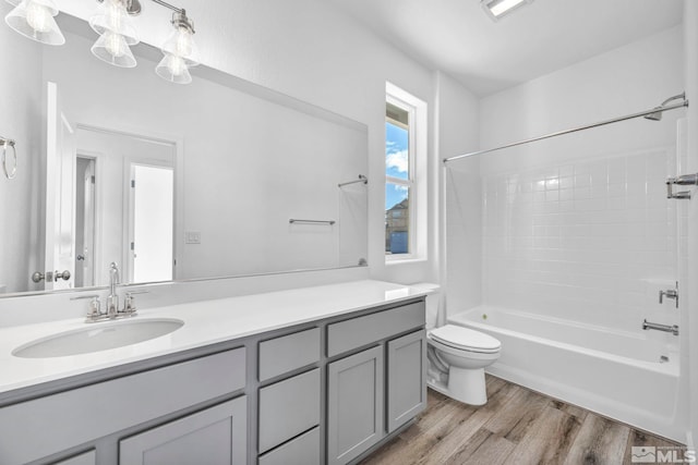 6772 Shell Ct Lot 49, Fernley, NV 89408 - full bath featuring toilet, wood finished floors, vanity, and  shower combination
