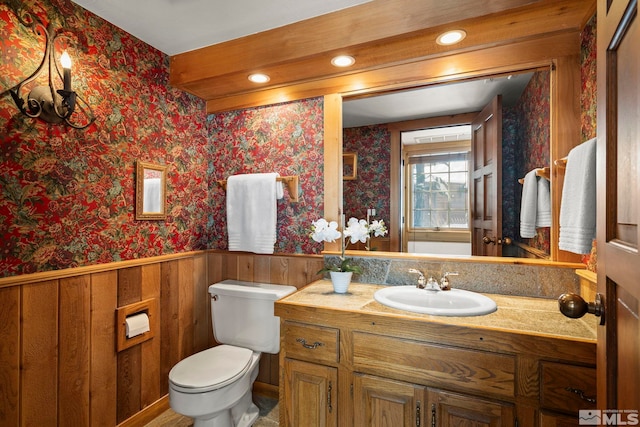 929 Northwood Unit 68, Incline Village, NV 89451 - half bath with wallpapered walls, toilet, vanity, recessed lighting, and wainscoting