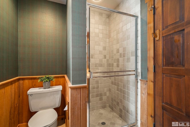 929 Northwood Unit 68, Incline Village, NV 89451 - bathroom featuring a stall shower, toilet, and wainscoting