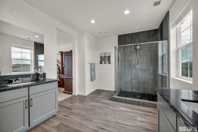 2181 Wyaconda Dr, Sparks, NV 89436 - full bath featuring a shower stall, vanity, wood finished floors, recessed lighting, and baseboards