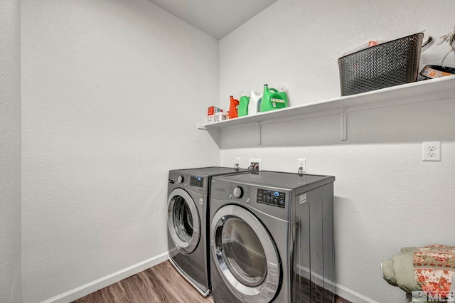 2181 Wyaconda Dr, Sparks, NV 89436 - washroom with washing machine and dryer, wood finished floors, and baseboards