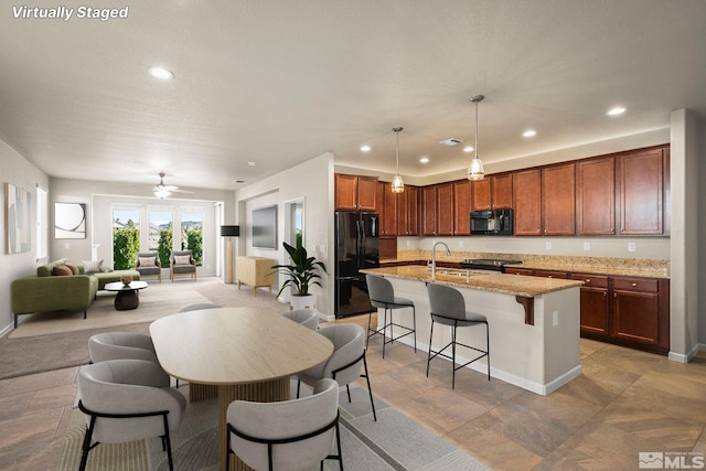 dining area featuring recessed lighting, ceiling fan, and baseboards