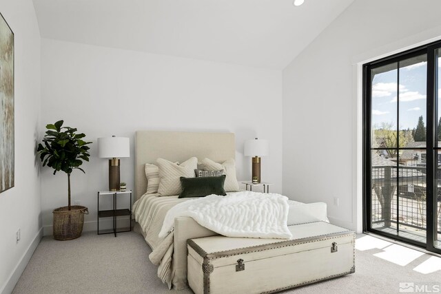 4060 Goodsell Ln, Reno, NV 89523 - bedroom featuring access to outside, light colored carpet, lofted ceiling, baseboards, and recessed lighting