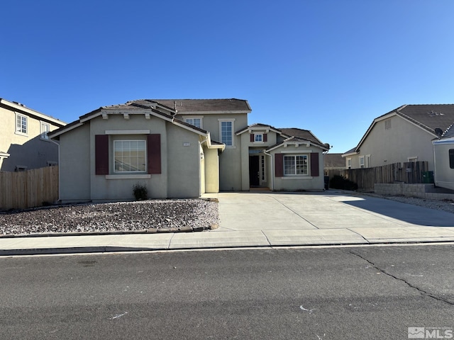 1313 Rouge Riv, Fernley, NV 89408 - traditional-style home with fence and stucco siding