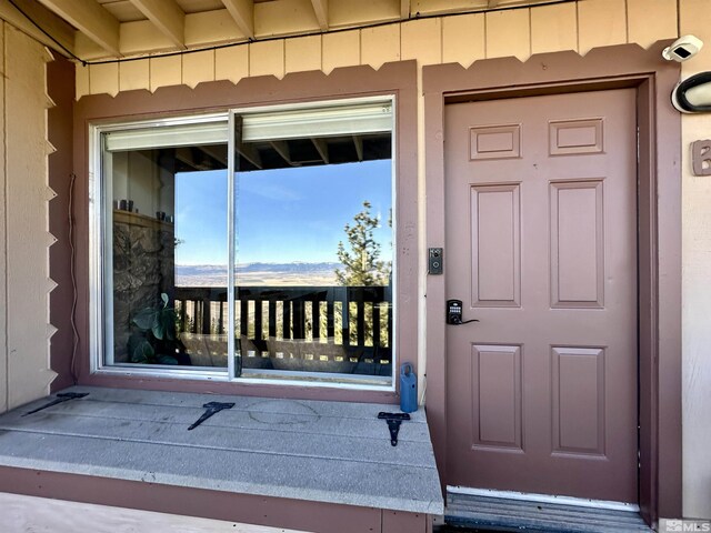 261 Quaking Aspen Ln Unit B, Stateline, NV 89449 - view of exterior entry with a security system
