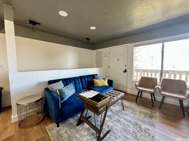 261 Quaking Aspen Ln Unit B, Stateline, NV 89449 - living area with wood finished floors, recessed lighting, and baseboards